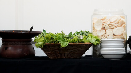 Assortment of Southeast Asian Culinary Delights Featuring Salad and Crisps