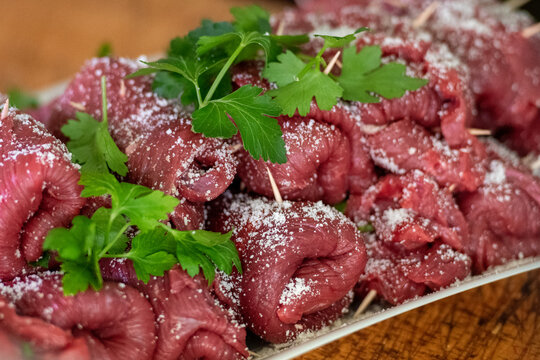 Horse meat Braciole or Brasciole, are a typical dish from the province of Bari in Puglia. Braciole are bundles of meat, stuffed with a mixture of parsley, garlic, and cheese in a butcher's for sale