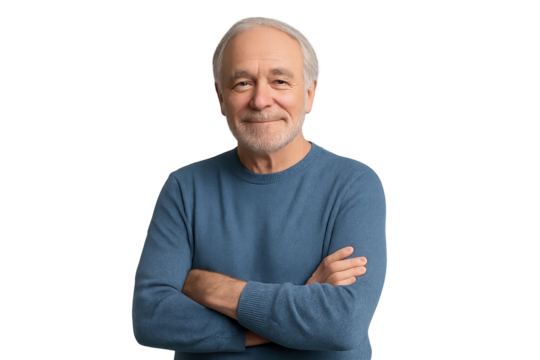 Smiling senior man with arms crossed wearing blue sweater indoors