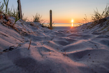 Sunset over Baltic Sea at Darß Peninsula in Germany reveals stunning colors and tranquil atmosphere
