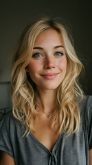 Fototapeta premium Cheerful Blonde Woman with Natural Beauty and Playful Smile in Casual Fashion - Studio Portrait