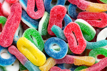 Sugar jelly sweet marmalade candies background. Tasty colorful chewy gummy sweets treat