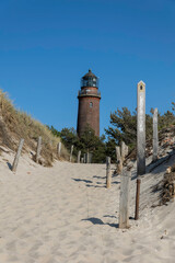Explore the scenic paths leading to Darßer Ort Lighthouse near the German Baltic Sea shore