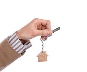 Real estate agent holding key with house shaped keychain on white background, closeup