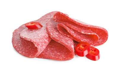 Slices of tasty smoked sausage and chili pepper isolated on white