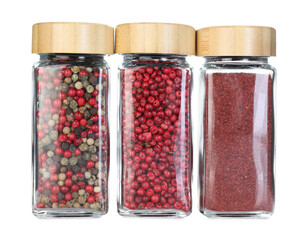 Many different aromatic spices in jars isolated on white