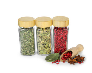 Many different aromatic spices in jars isolated on white
