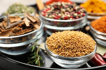 Many different aromatic spices on table, closeup