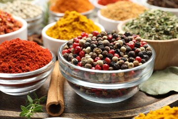 Many different aromatic spices on table, closeup