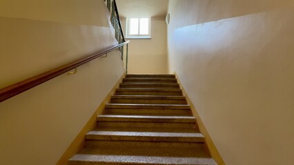 Exploring Stairway Perspective Bathed in Soft, Warm Lighting for a Captivating Atmosphere