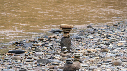 Balancing stones in nature, rivers and jungle