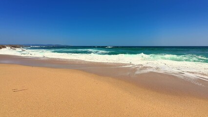 Wonderful Beautiful Beach with Refreshing Waves and Clear Bright Blue Skies Above