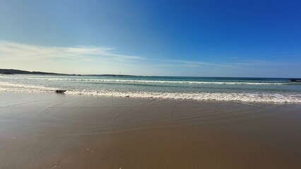 Stunningly Beautiful Seaside Landscape featuring Azure Blue Skies and Coastal Views