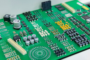 Fototapeta premium Russia. Moscow. A sample of an electronic board with placed components.