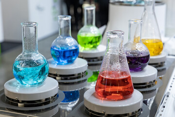Russia. Moscow. Laboratory utensils with colored liquid.