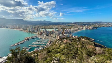 Fototapeta premium A breathtaking, stunning aerial view showcasing the beautiful coastal city and its vibrant marina