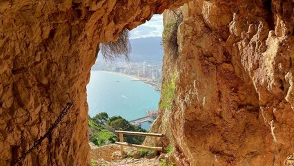 Fototapeta premium Embarking on an adventure through ancient caves that lead to breathtaking scenic views