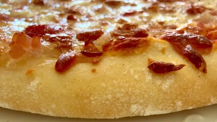 A Closeup of a Delicious Pizza with Crispy Toppings that is Mouthwatering and Appealing