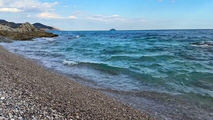 Experience Serene Coastal Views Featuring Calm Waters and a PicturePerfect Pebble Beach