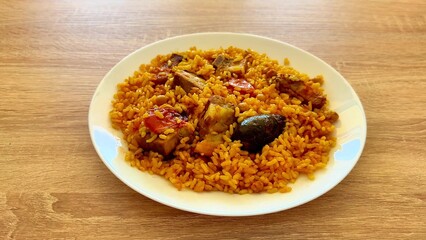 Savor delicious Jollof Rice with Chicken and Vegetables, a true joy for any gathering