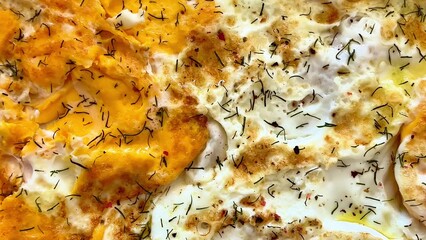 Deliciously Cooked Eggs with Flavorful Seasoning Decoratively Arranged on a Plate