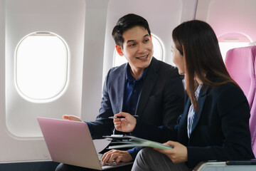 Business People Working on Airplane