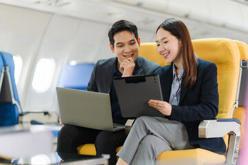 Business People Working on Airplane