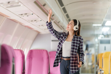 Woman Enjoying Airplane Flight
