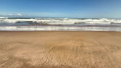 A Beautiful and Serene Beach Landscape Featuring Gentle Waves and Soft Golden Sand