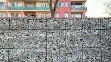 This is a beautiful decorative stone wall featured against an apartment background setting