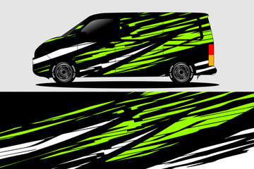 Obraz premium Van with Bold Green and Black Graphic Design Wrap