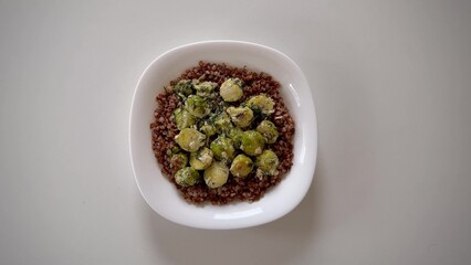 A delicious Quinoa and Brussels Sprouts Bowl filled with an array of fresh green veggies