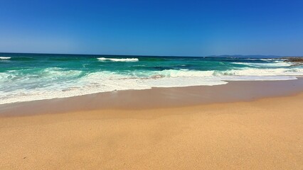 The scenic Tropical Beach boasts crystal clear water alongside soft, inviting sand