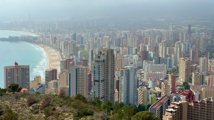 Fototapeta premium A Stunning Aerial View of a Coastal City Featuring Impressive Skyscrapers and a Beautiful Beach