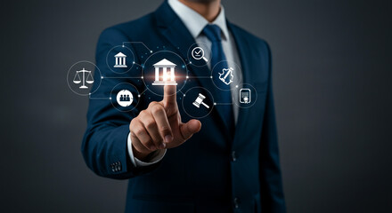 Man in suit touching law and justice icons on screen representing legal technology and services