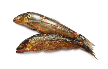 Two tasty smoked herrings on white background, top view