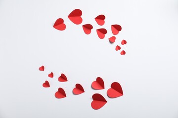 Many paper hearts on light grey background, flat lay. Space for text