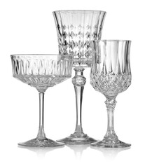 Different empty clean glasses isolated on white