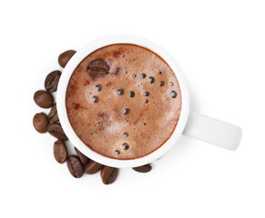 Aromatic coffee in cup and beans isolated on white, top view