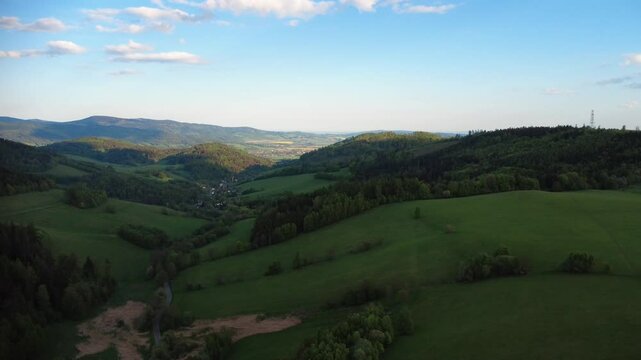 Beautiful landscape with Czech mountains in Doln&iacute; Morava, located in the Kr&aacute;lick&yacute; Sněžn&iacute;k region. Rolling hills, lush forests, and open skies create a peaceful and mountain view in the heart oF Czech.