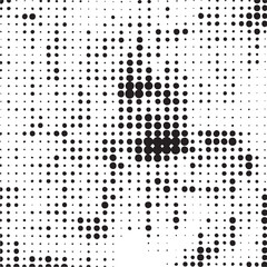 A dense arrangement of black dots dominates a white background forming an abstract shape.