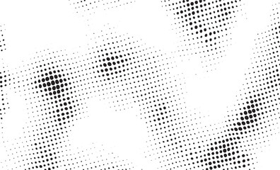 A dynamic abstract of numerous small black dots layered over a bright white background.