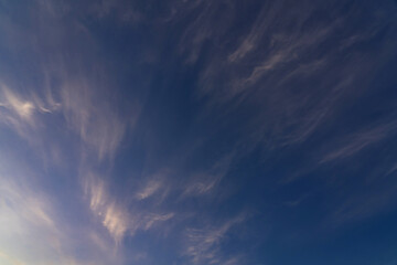summer evening, sunset in yellow, orange and pink with clouds, background