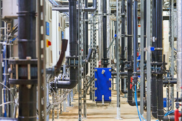 Detailed Interior View of a Complex Industrial Piping and Plumbing System