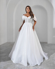 Elegant Bride in White Wedding Gown