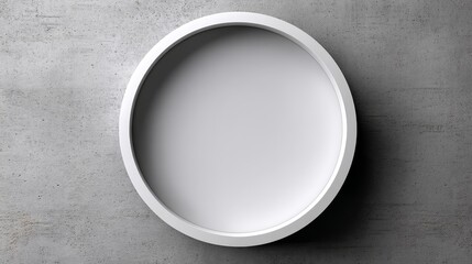 Modern circular white wall clock against concrete background