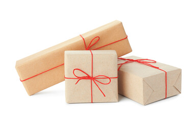 Many gift boxes wrapped in kraft paper isolated on white