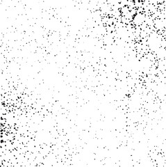 Obraz premium A textured black and white shows a scattered of small dots.