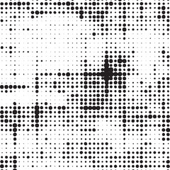 A dense monochrome portrait reveals a subtle human face through numerous scattered black and white dots.