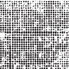 A dense monochrome of numerous small scattered circles creates a textured surface.